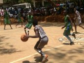 Point guard Sydney Ochieng shows of his dribbling skills as Aga Khan shift into attack gear in the finals of the games against St. Georges of Kilifi County