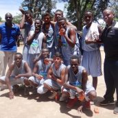 Coach Jimnah Kimani (far right) with the AKA Mombasa Open Boys' Basketball team